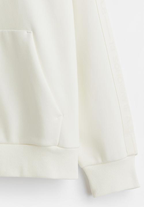 H&M - Loose fit hoodie with side stripes - cream