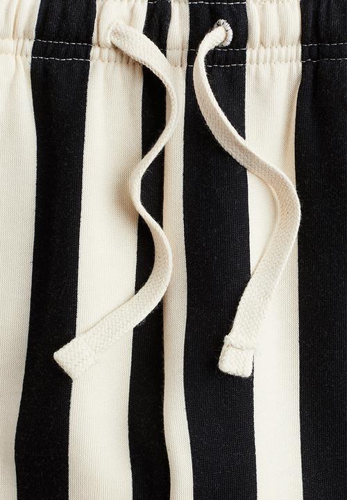 H&M - Printed joggers - black & white striped