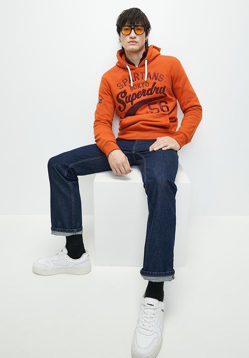 Superdry. - ATHLETIC SCRIPT GRAPHIC HOODIE - Denim Co Rust Orange