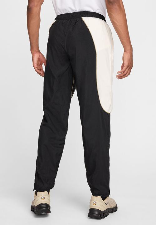 Nike - Strike+  Water-Repellent Football Pants - Black/Pale Ivory/Jersey Gold