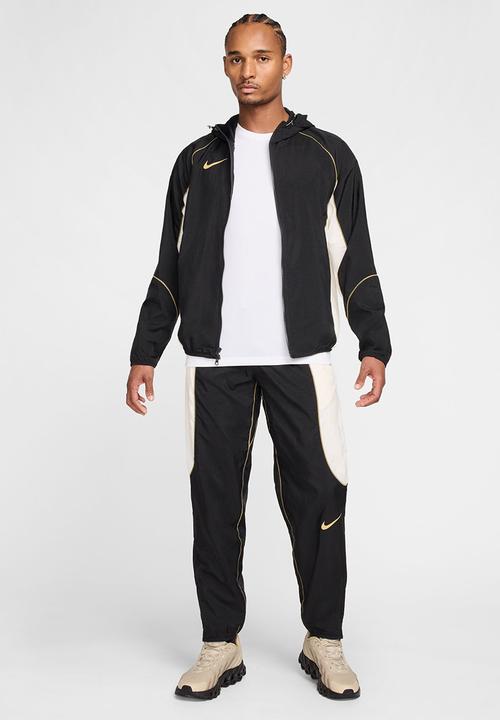 Nike - Strike+  Water-Repellent Football Pants - Black/Pale Ivory/Jersey Gold
