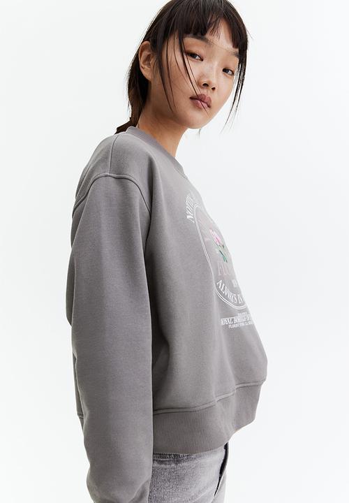 H&M - Oversized motif-front sweatshirt - grey roses