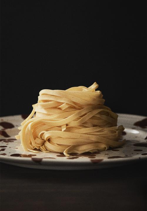 H&M - Large stoneware plate - brown/spotted
