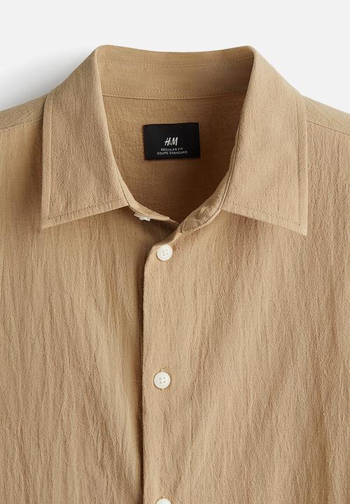 H&M - Regular fit crinkled short-sleeved shirt - beige