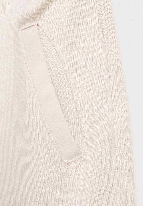 MANGO - Joggers soller - natural