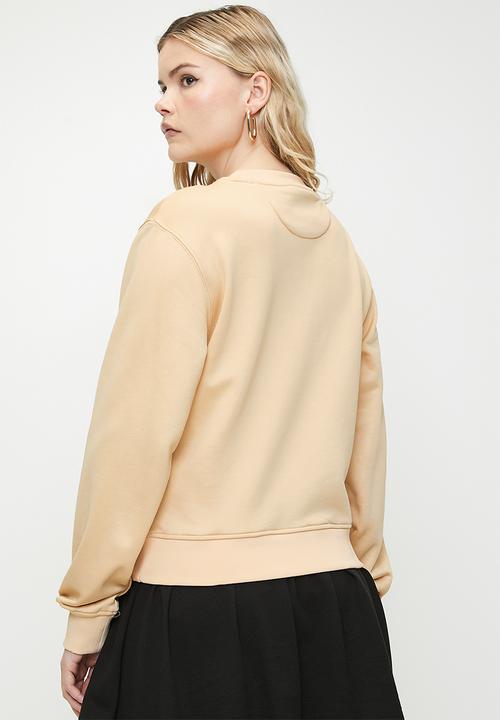 GUESS - CN PEONY LOGO FLEECE-SKINNY LATTE