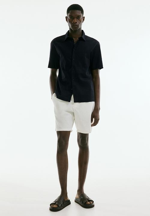 H&M - Regular fit short-sleeved linen-blend shirt - navy blue