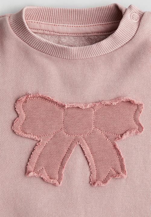 H&M - Appliquéd sweatshirt - pink bow