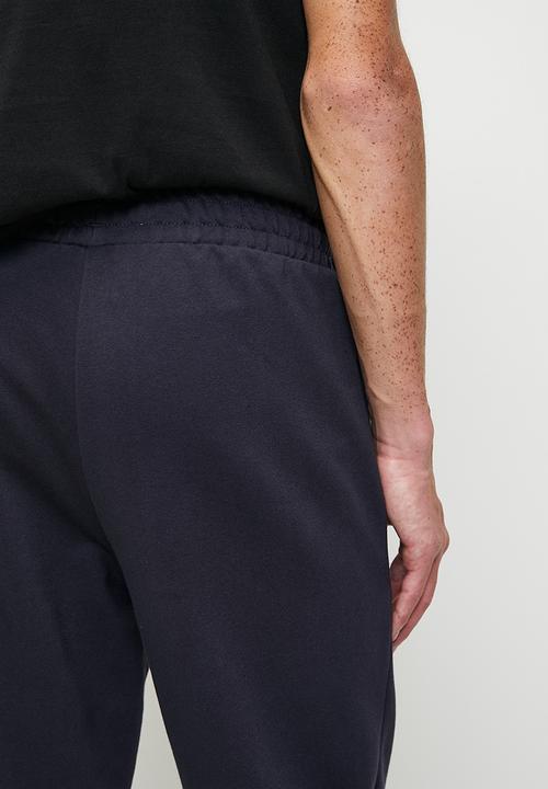 PUMA - ESS Sweatpants TR cl M - New Navy