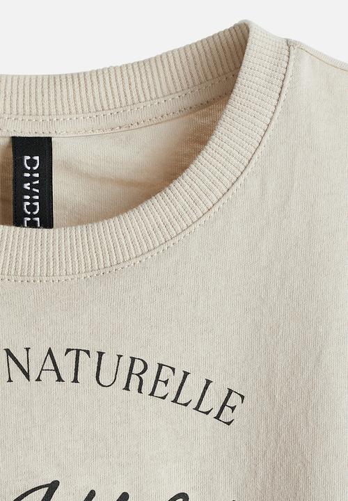 H&M - Cropped printed T-shirt - light beige/botaniques