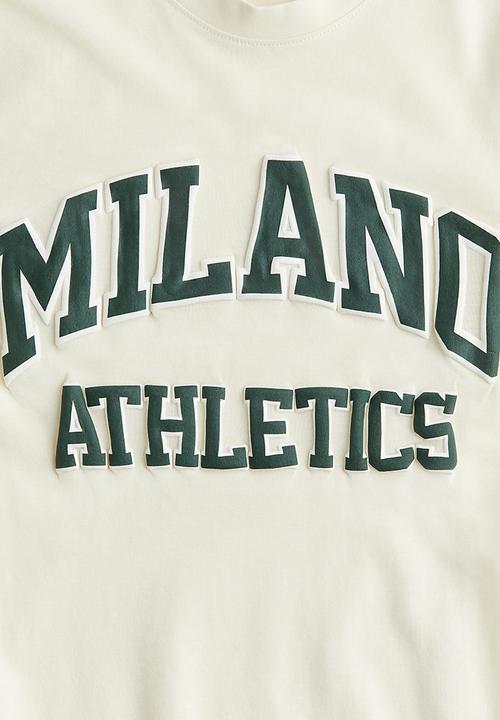 H&M - T-shirt - pale yellow & milano athletics