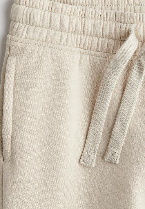 H&M - Cotton sweatshirt joggers - light beige