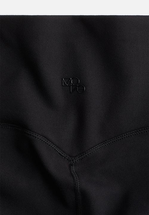 H&M - Flared sports leggings with softmove™ - black