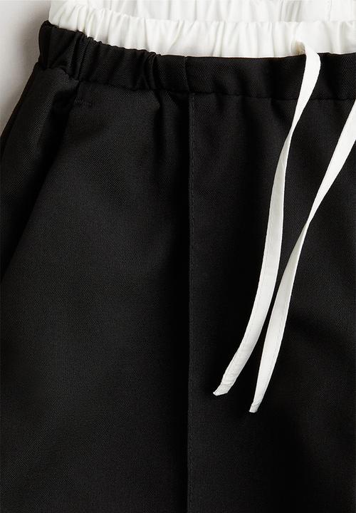 H&M - Straight leg trousers - black