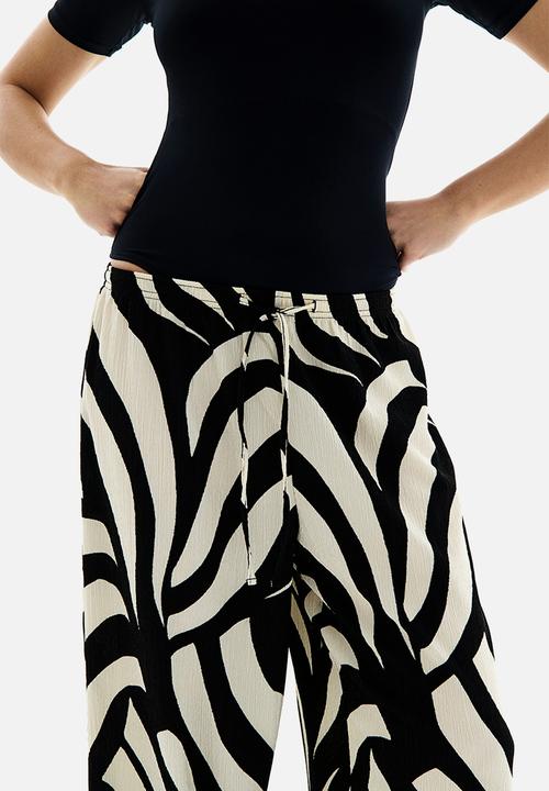 H&M - Textured jersey drawstring trousers - black patterned