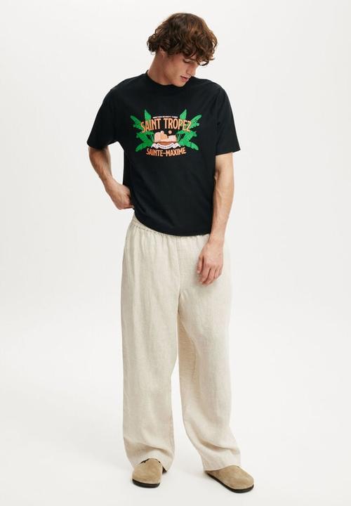 Cotton On - Cropped fit graphic t-shirt - black/saint tropez