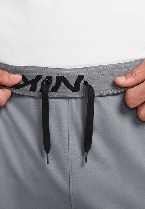 Nike -  Totality Dri-FIT Tapered Versatile Trouser - Soke Grey/Black