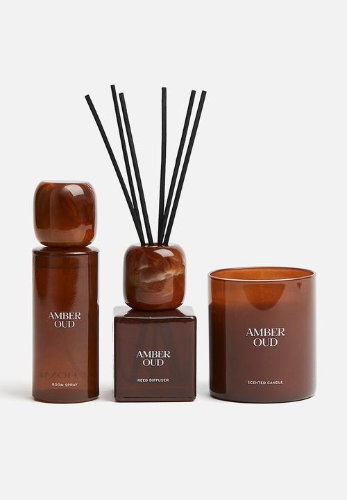 H&M - Scented candle in a glass holder - amber oud