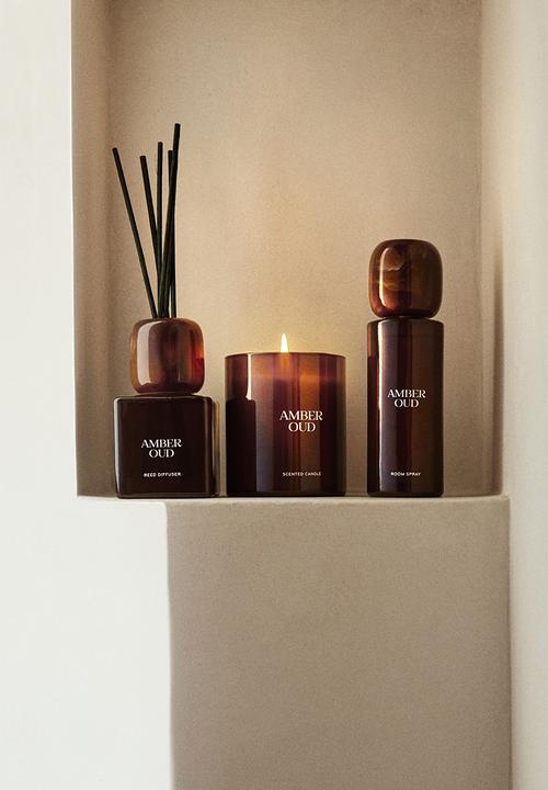 H&M - Scented candle in a glass holder - amber oud