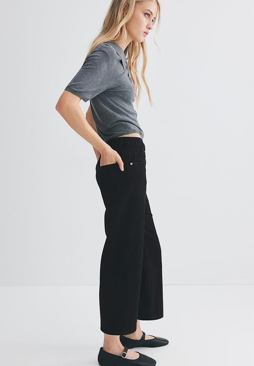 H&M - Wide high cropped jeans - black