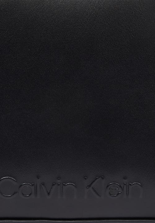 Calvin Klein - Embossed logo camera bag- ck black