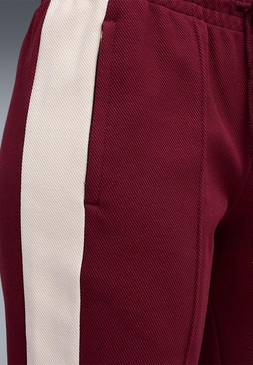 PUMA - T7  Flared Pants - Ruby Shimmer