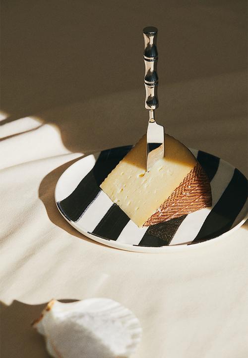 H&M - Patterned stoneware mid plate - black striped