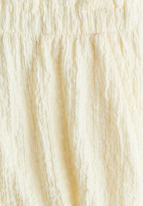 H&M - Crinkled jersey shorts - light yellow