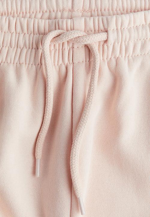 H&M - High-waisted joggers - light peach pink