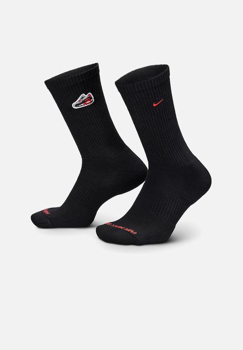 black nike socks with red swoosh