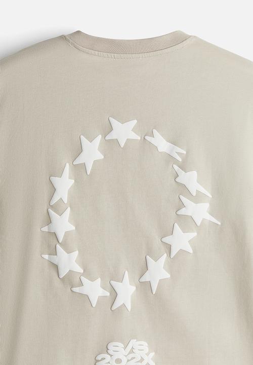 H&M - Loose fit printed t-shirt - beige stars