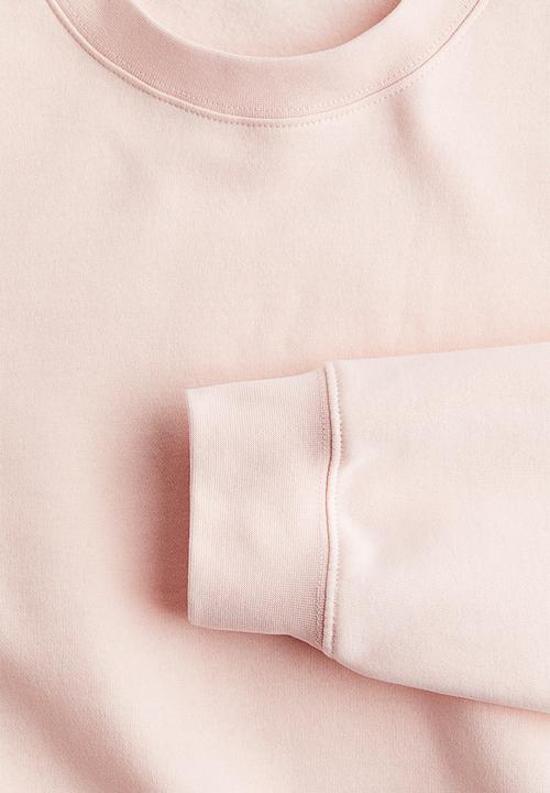 H&M - Loose-fit sweatshirt - light peach pink 