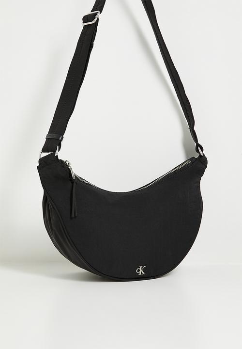 Calvin Klein - Luna nylon sling bag - black