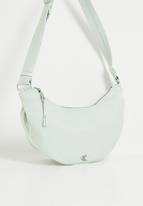 Calvin Klein - Luna nylon sling bag- sky grey
