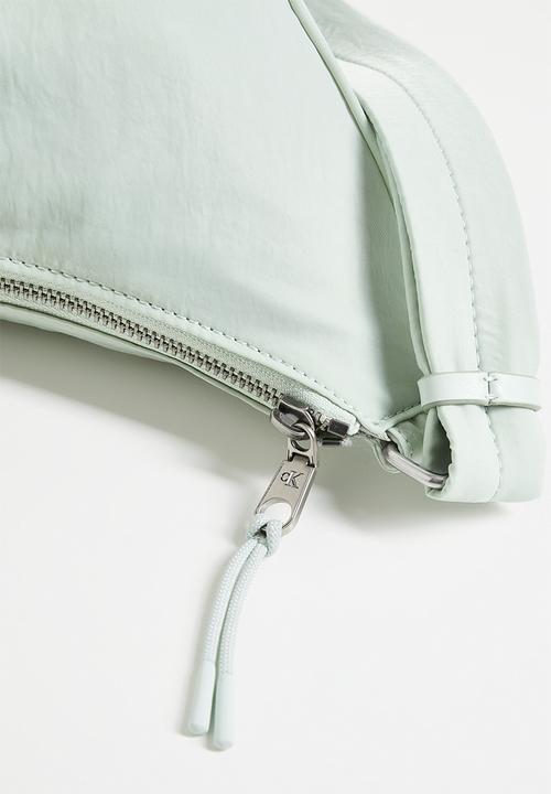 Calvin Klein - Luna nylon sling bag- sky grey