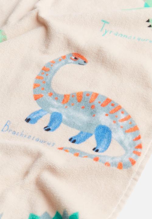H&M - Patterned bath towel - light beige dinosaurs