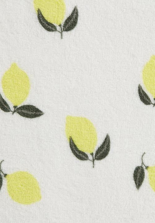 H&M - Patterned fleece blanket - light beige lemons