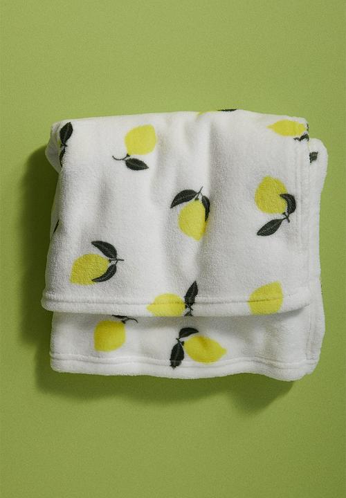 H&M - Patterned fleece blanket - light beige lemons