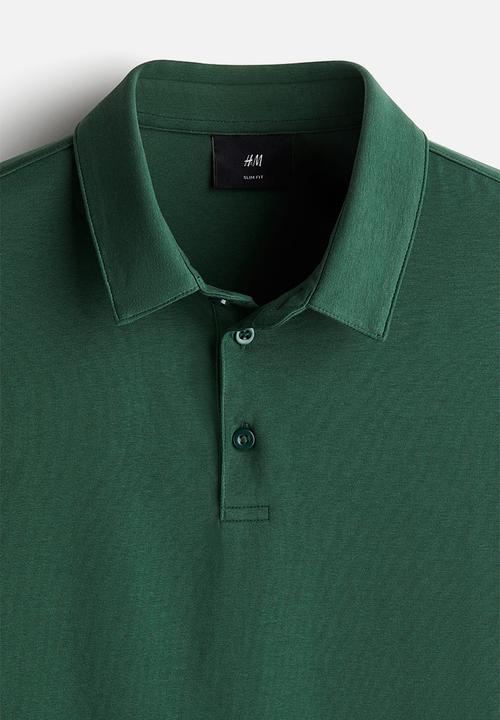 H&M - Slim fit polo shirt - forest green