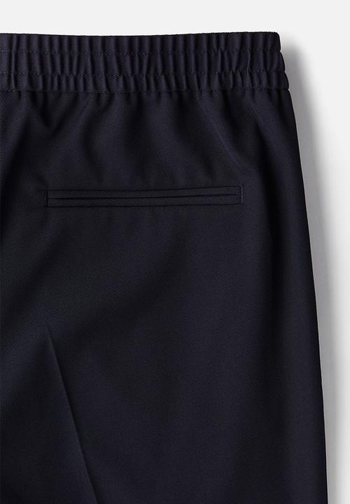 H&M - Slim fit twill trousers - navy blue