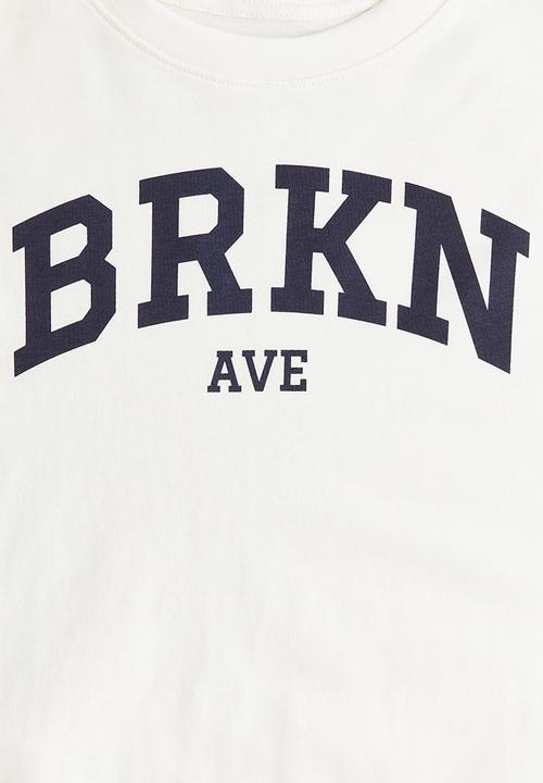 H&M - Oversized cotton t-shirt - white brkn ave