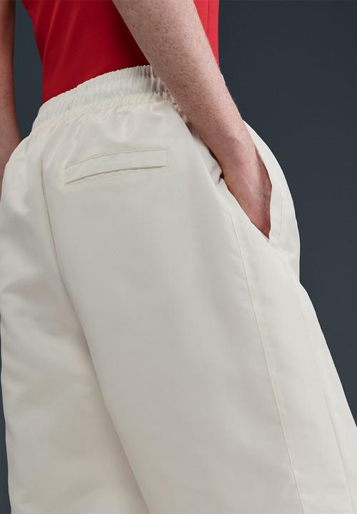 Nike - Nike winderunner shine pant - sail/black