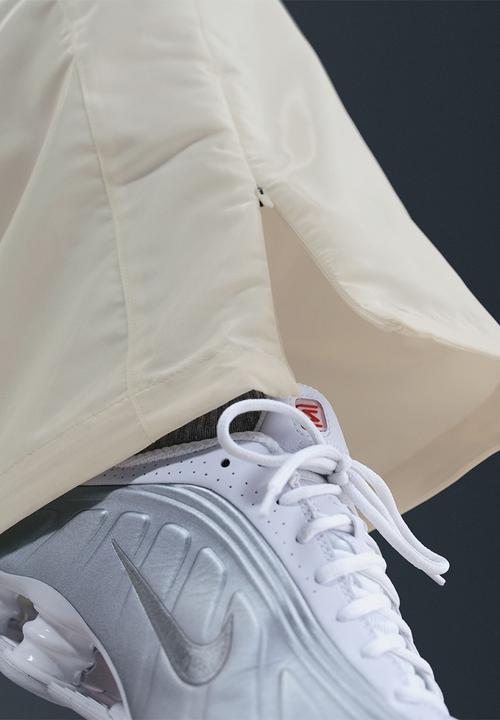 Nike - Nike winderunner shine pant - sail/black