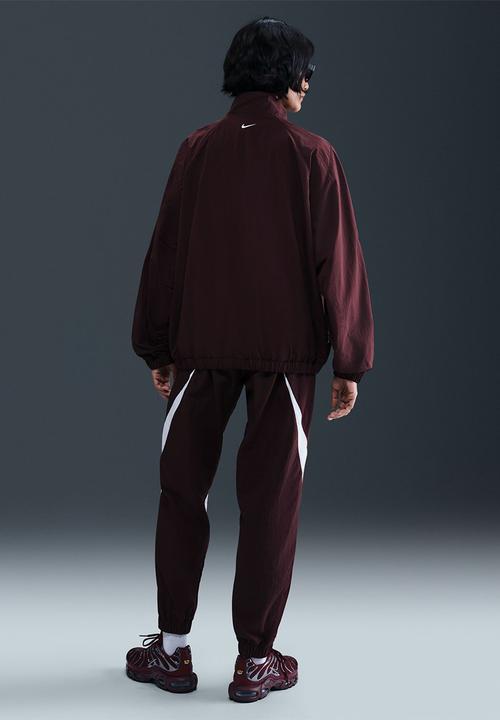 Nike womens woven track jkt - burgundy crush/burgundy crush/white