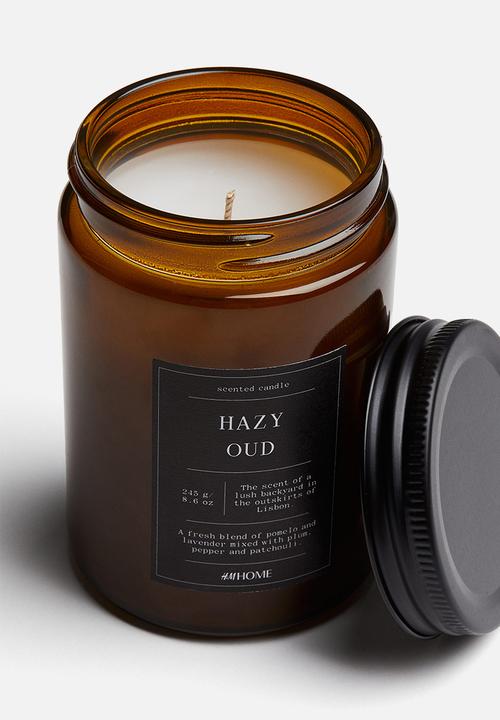 H&M - Small scented candle in glass holder - hazy oud