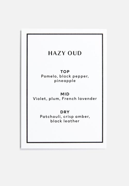H&M - Small scented candle in glass holder - hazy oud