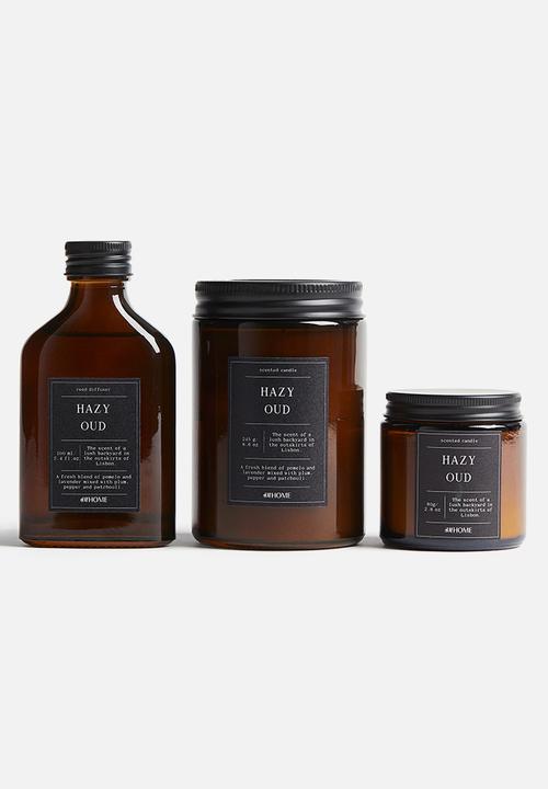 H&M - Small scented candle in glass holder - hazy oud
