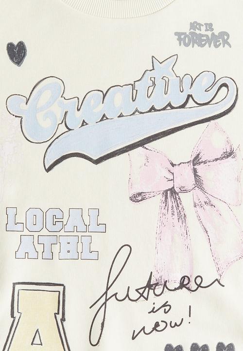 H&M - Oversized sweatshirt - cream creative