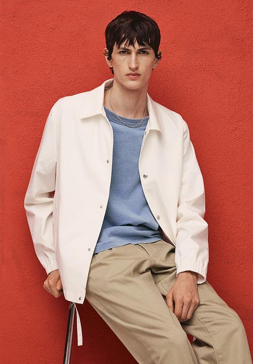 H&M - Regular fit crease-leg chinos - beige