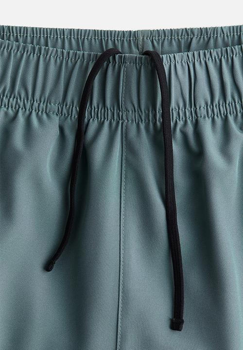 H&M - Mid-length sports shorts with drymove™ - turquoise